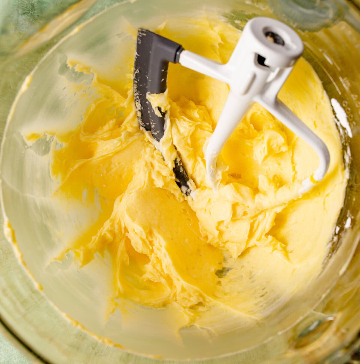 powdered sugar, butter, vanilla, almond extract and egg in a mixer bowl