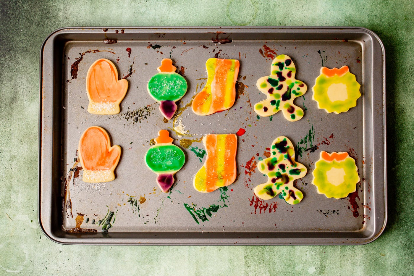 paintbrush cookies on a baking sheet