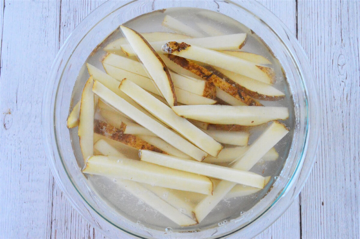 french fries soaking in water