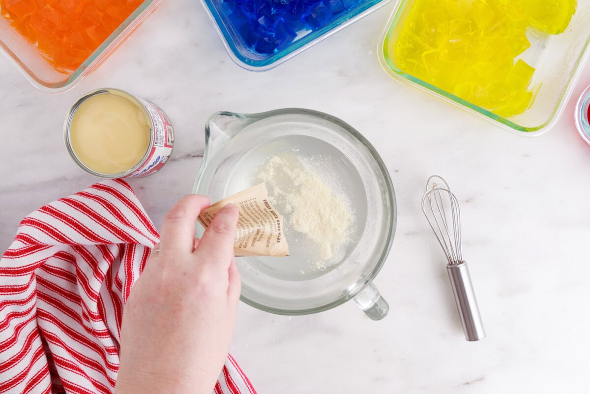 pouring gelatin into water