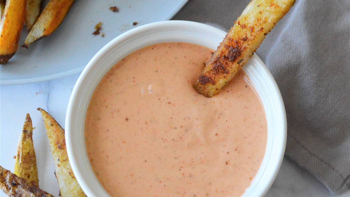 Homemade french fry sauce is made with mayo, ketchup, and pickle juice then spiced with paprika, oni