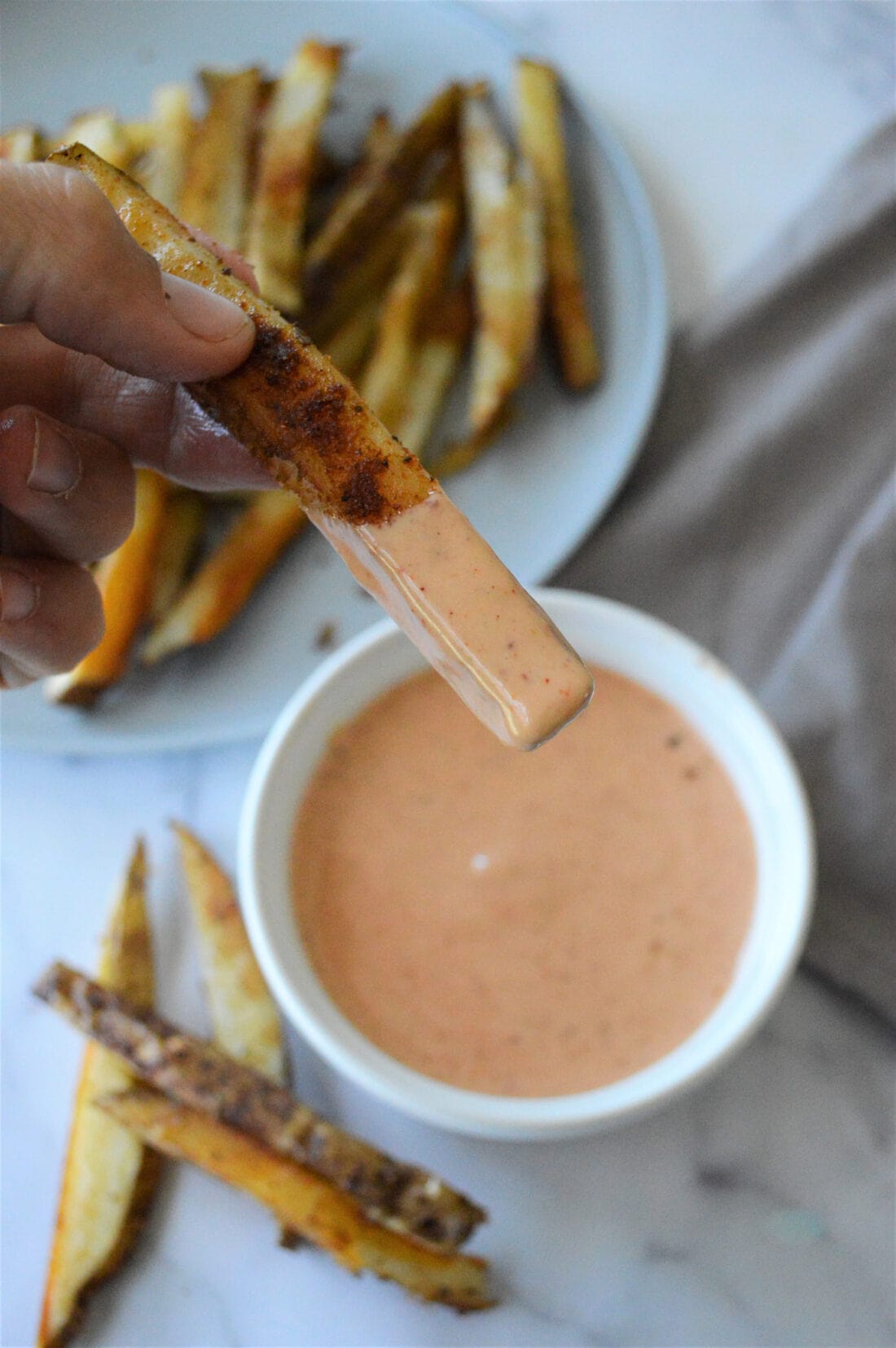 french fry dipped in French Fry Sauce