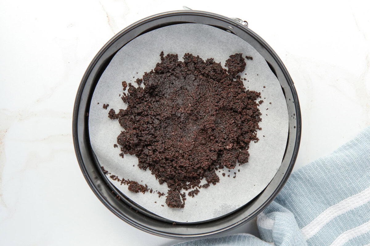 oreo crumbs in a springform pan