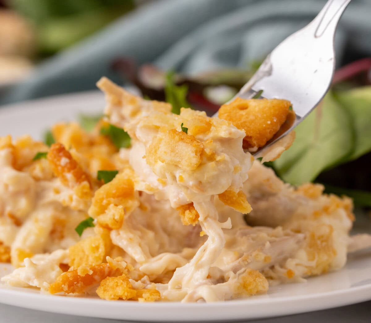 fork full of Million Dollar Chicken Casserole