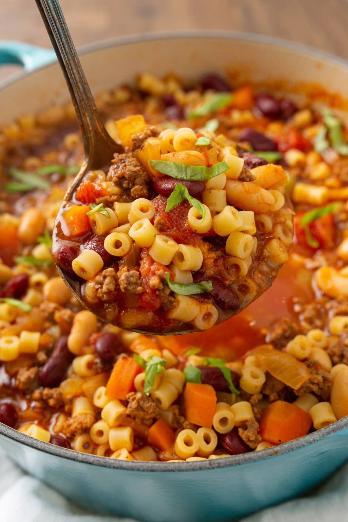 ladling out Pasta Fagioli soup