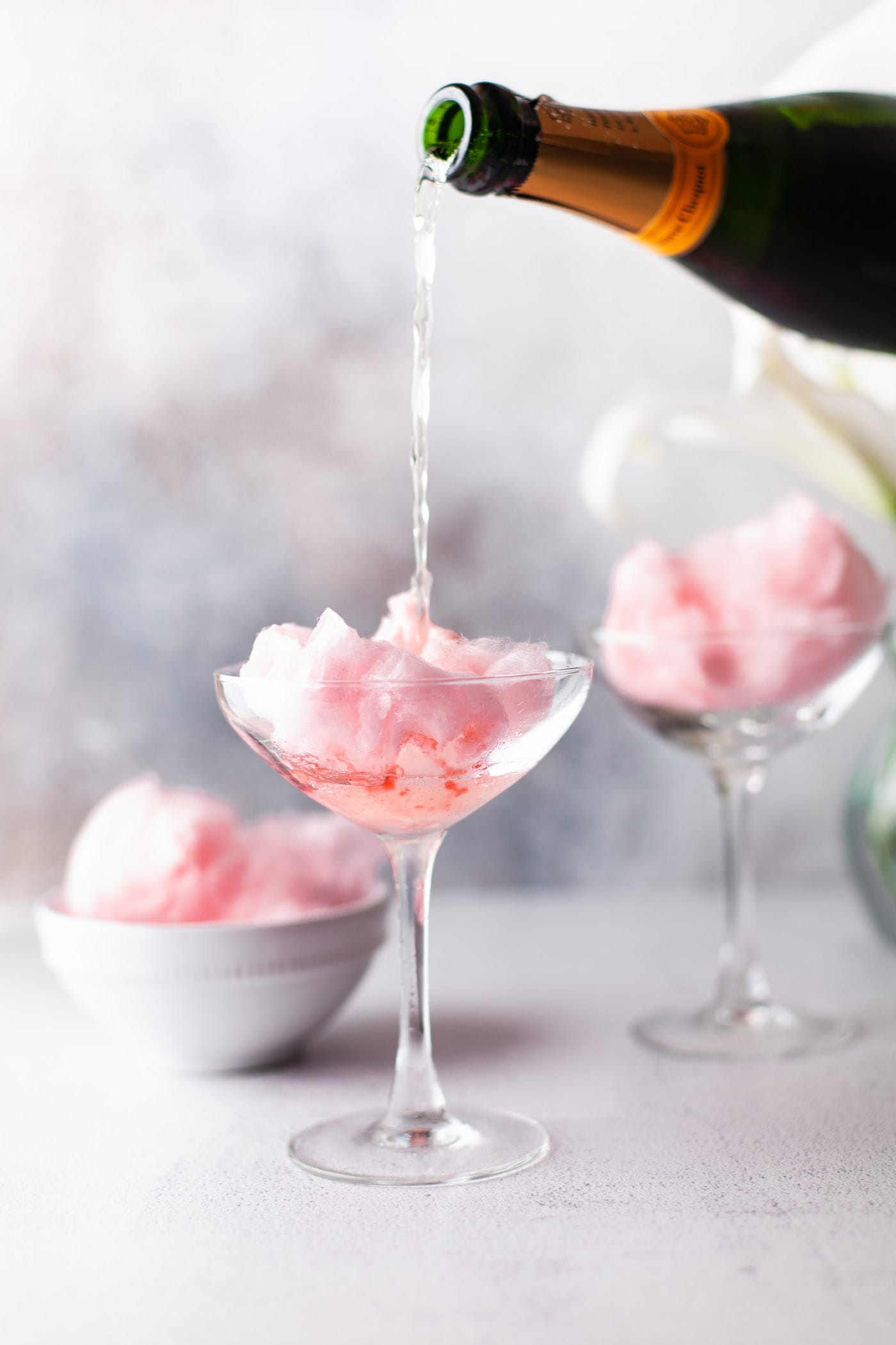 pouring champagne over cotton candy