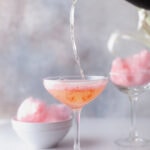pouring champagne into cotton candy champagne