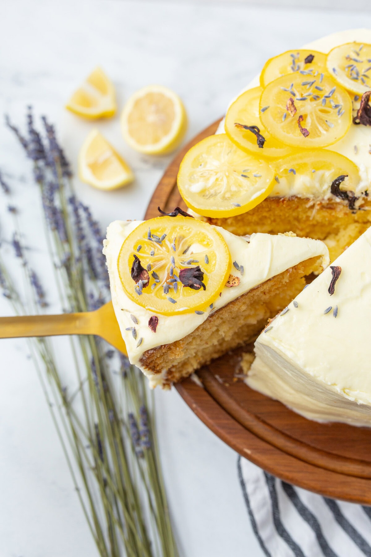 removing slice of lemon cake with spatula