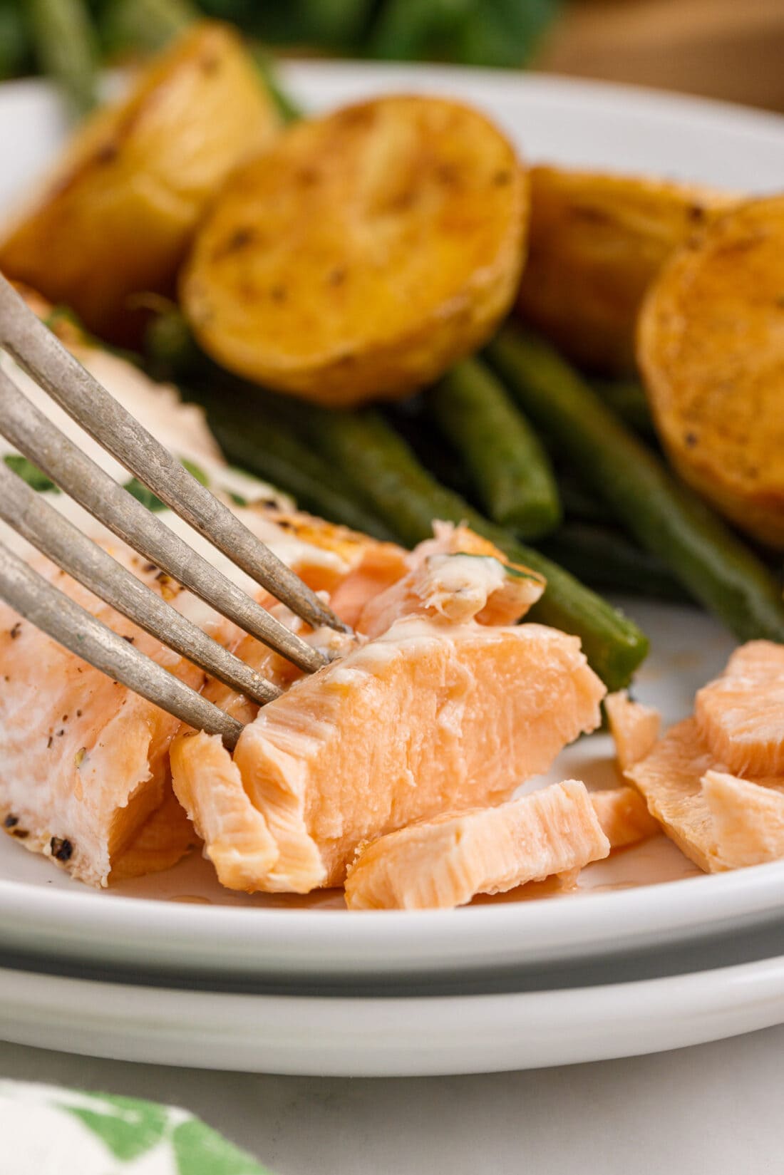 fork flaking Baked Salmon