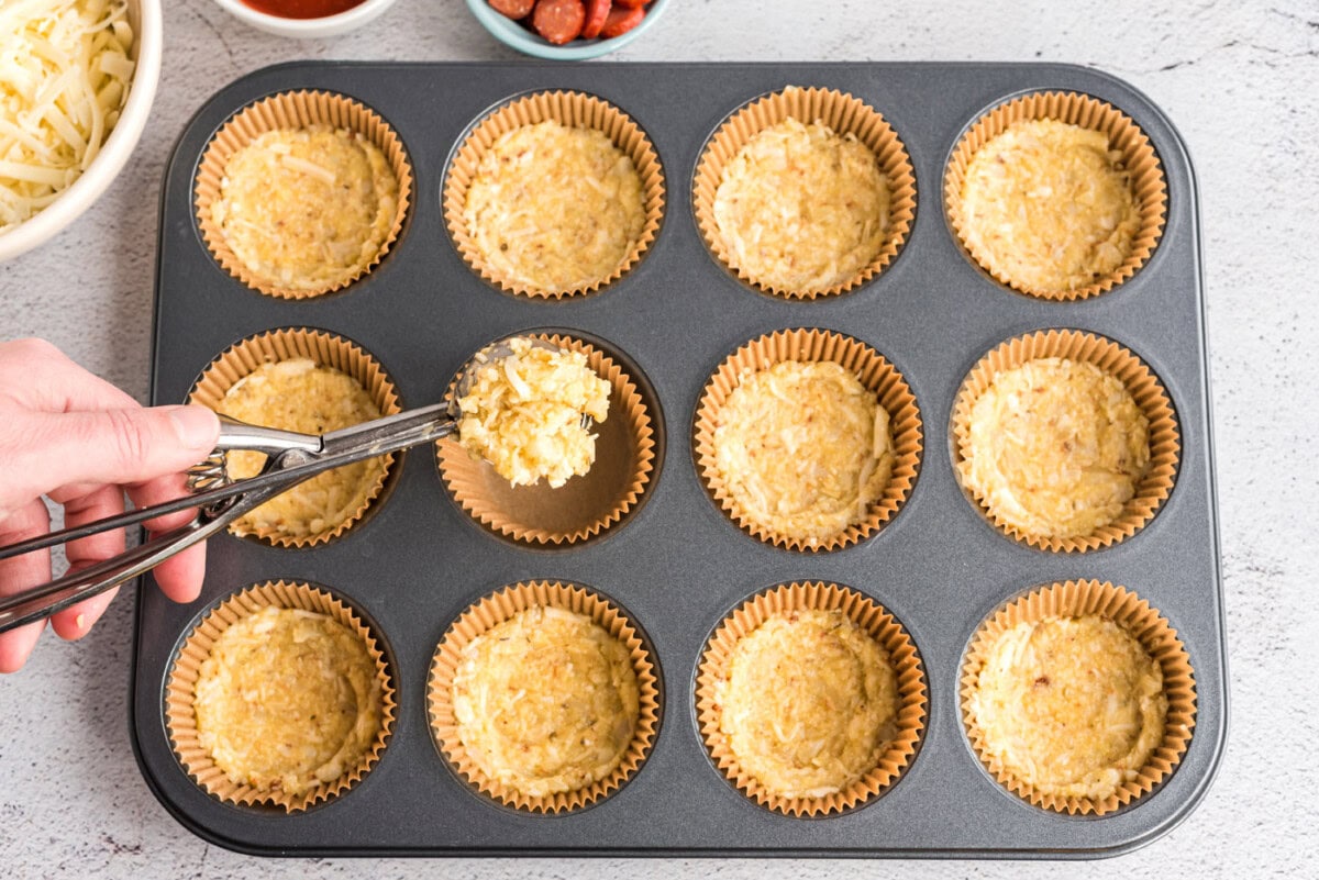 cauliflower pizza crust in muffin tin