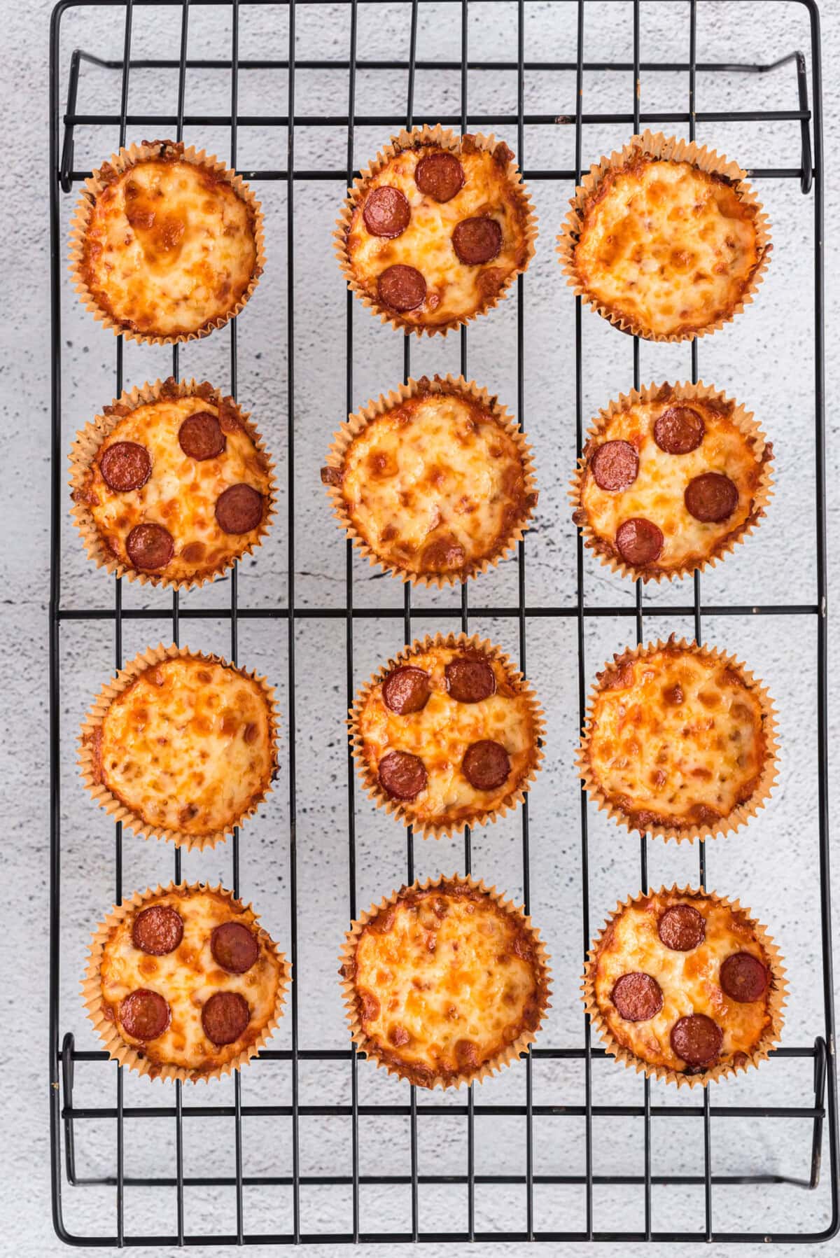Cauliflower Pizza Bites on a wire rack