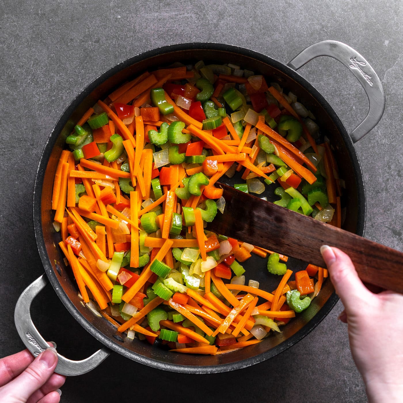 sauteeing veggies in a pan