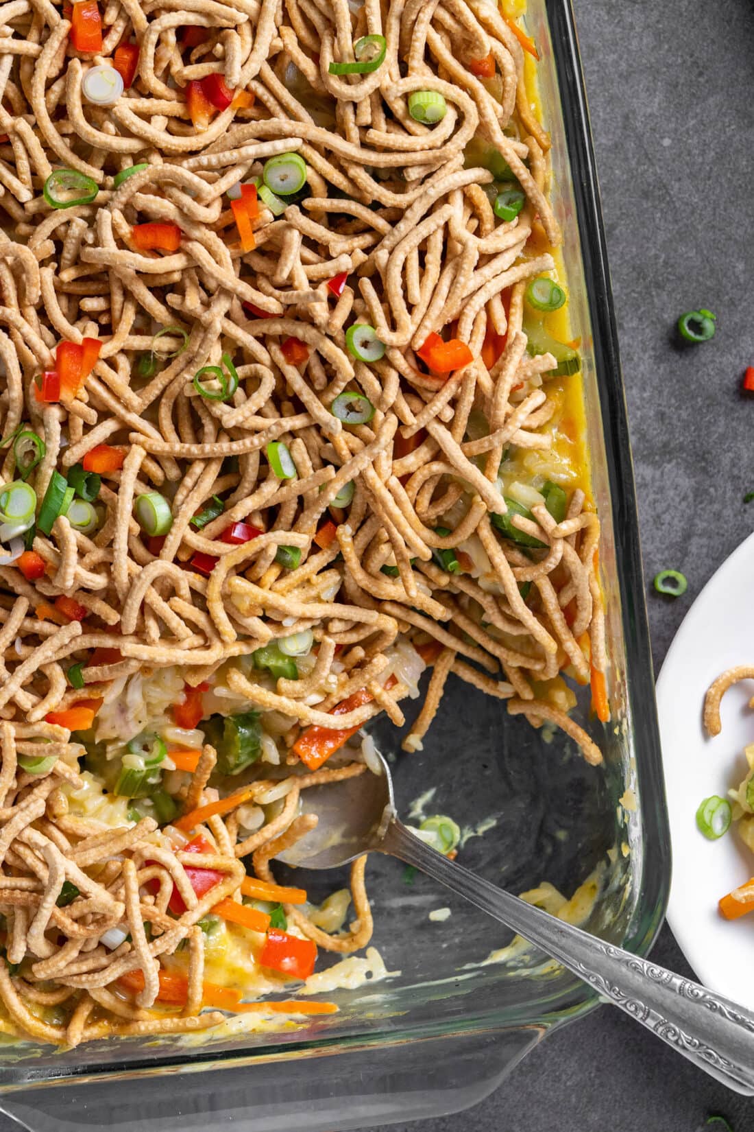 Chicken Chow Mein Casserole with a serving spoon