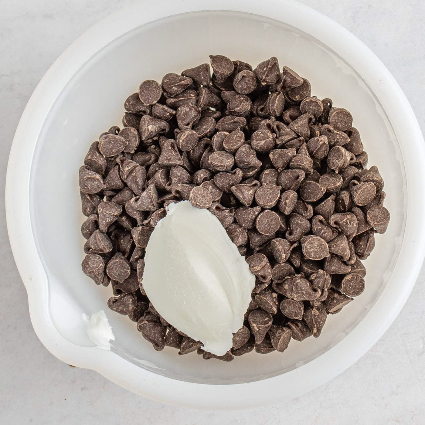 chocolate chips and crisco in a bowl