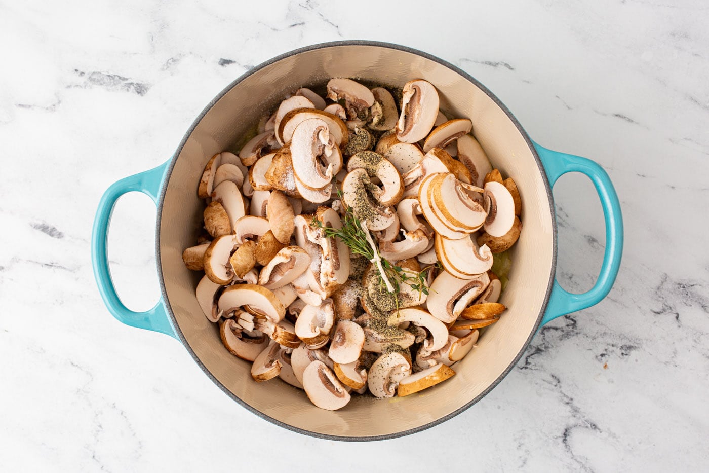mushroom and seasonings in a large dutch oven