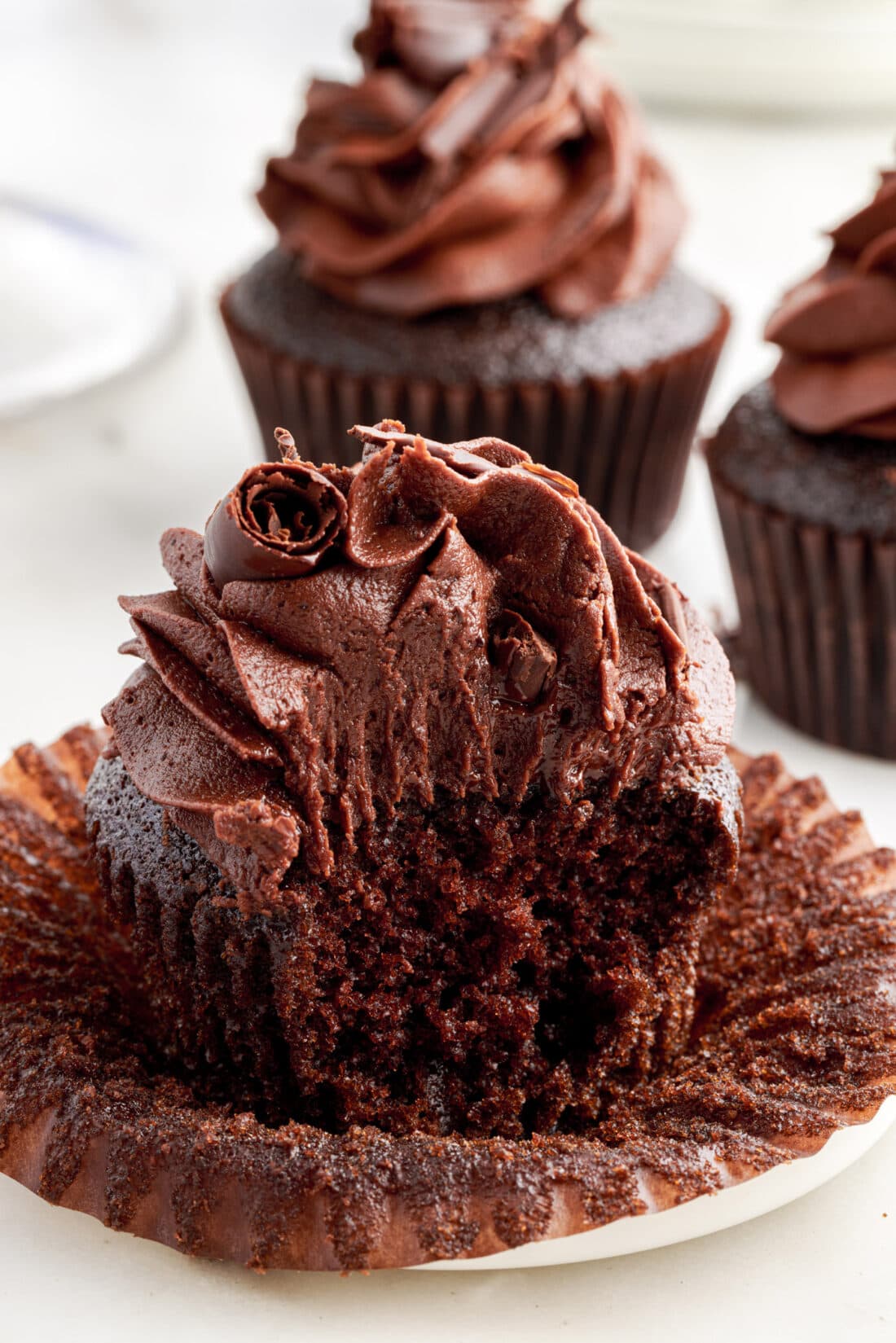 Close up of a Double Chocolate Cupcake with a bite taken out