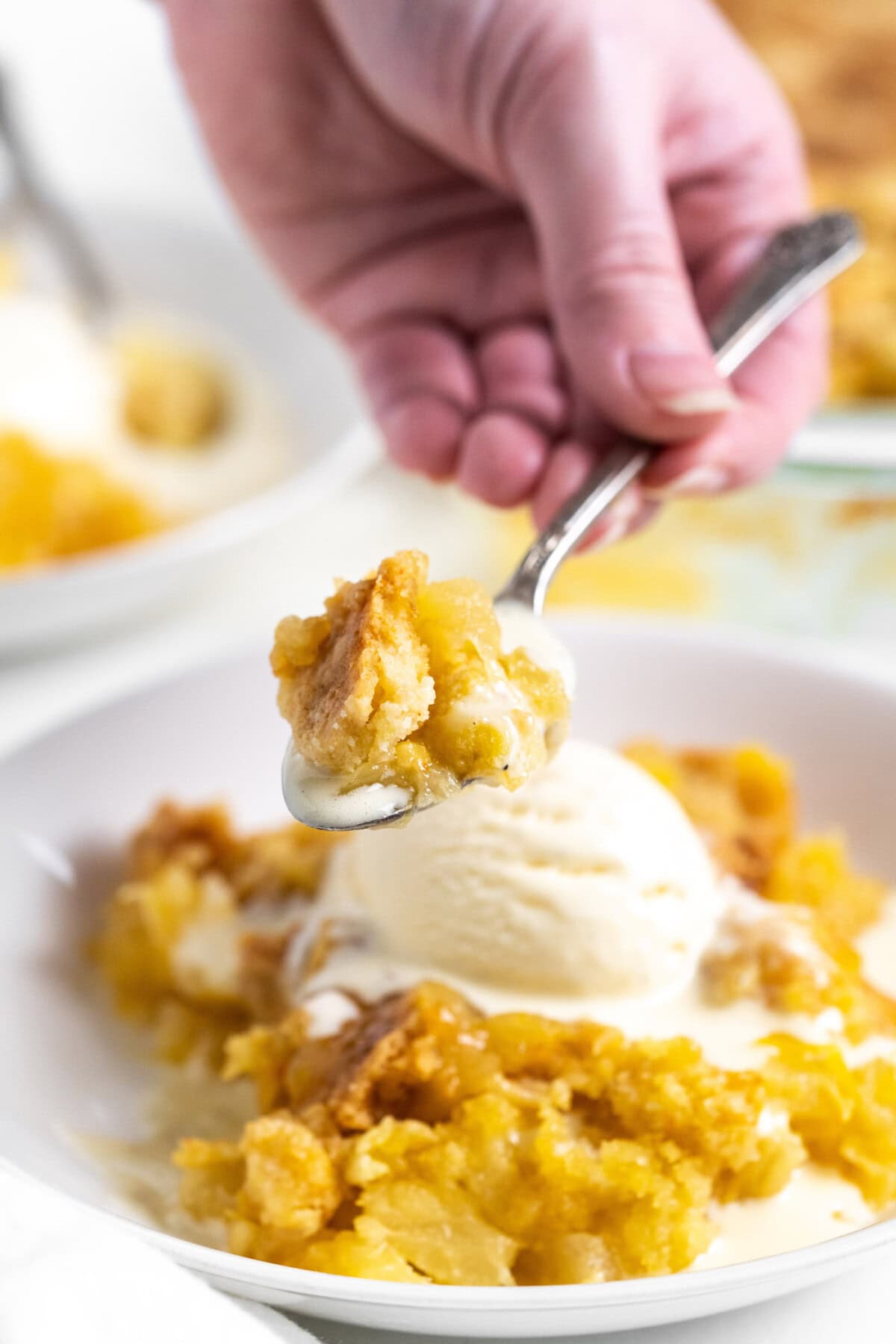 spoon of Pineapple Dump Cake