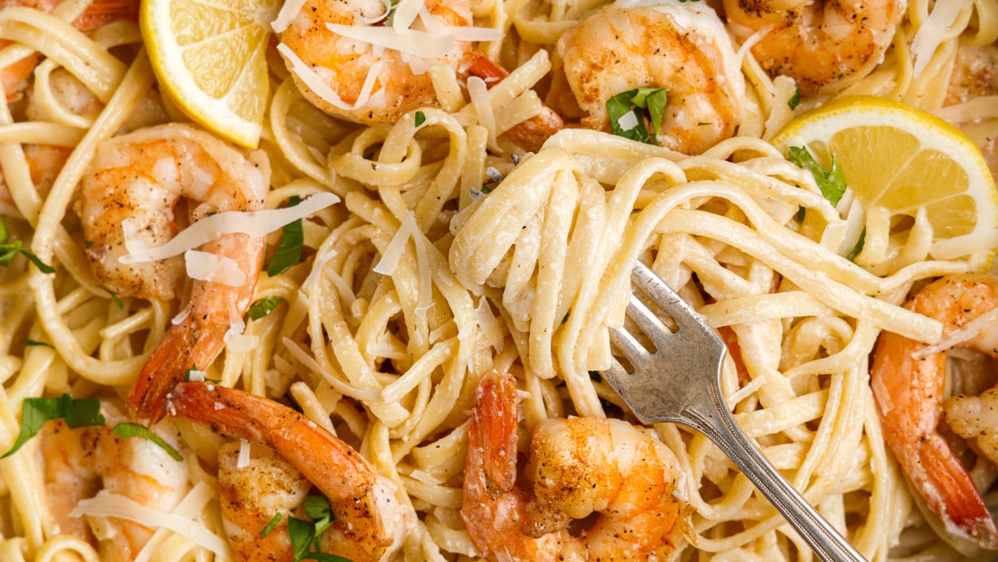 Shrimp pasta with a buttery lemon garlic sauce, tender noodles, and plump shrimp. A quick and easy o