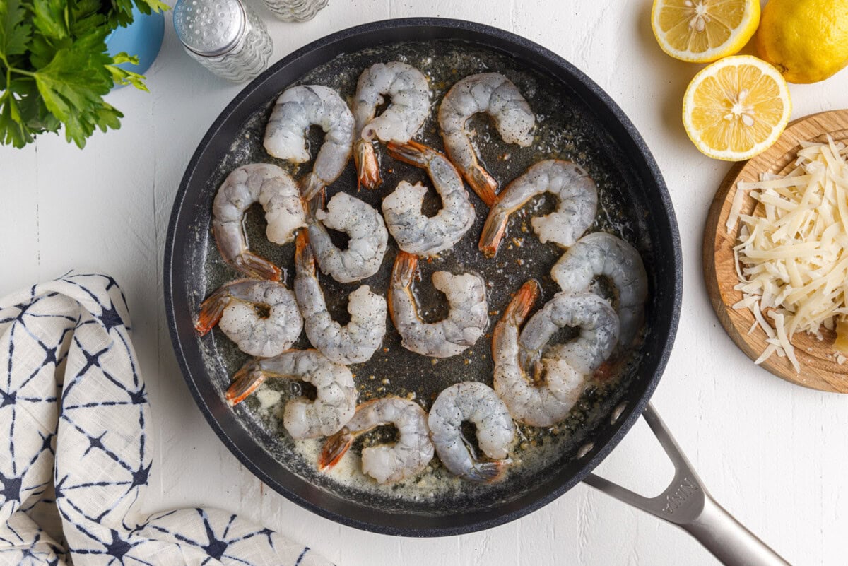 raw shrimp in a frying pan