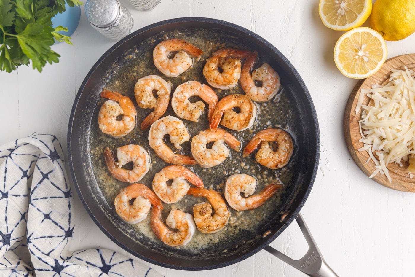 cooked jumbo shrimp in a skillet