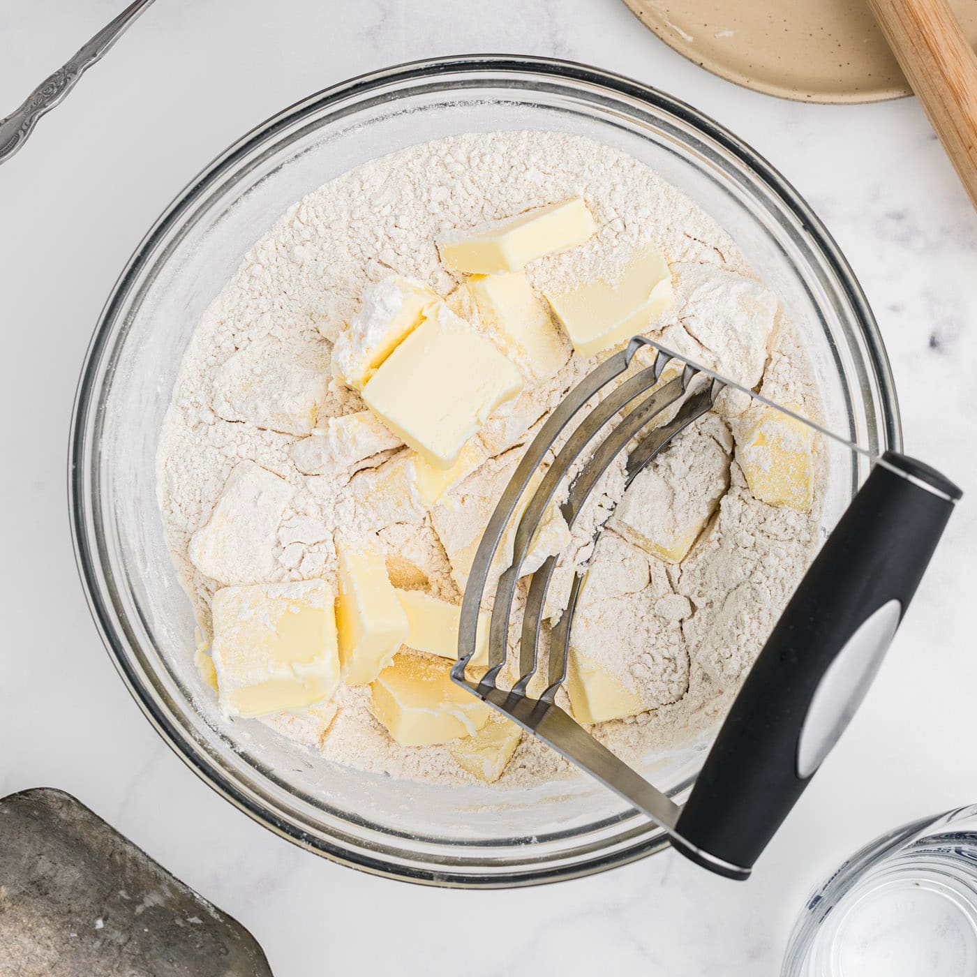cutting butter into flour mixture