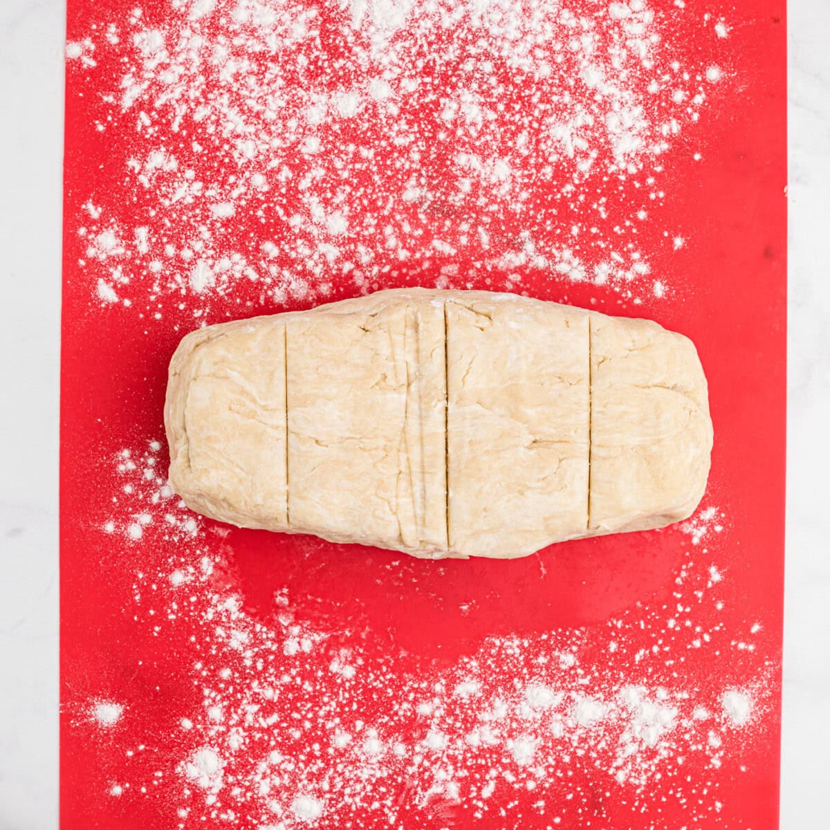 pie dough rolled and sliced into sections