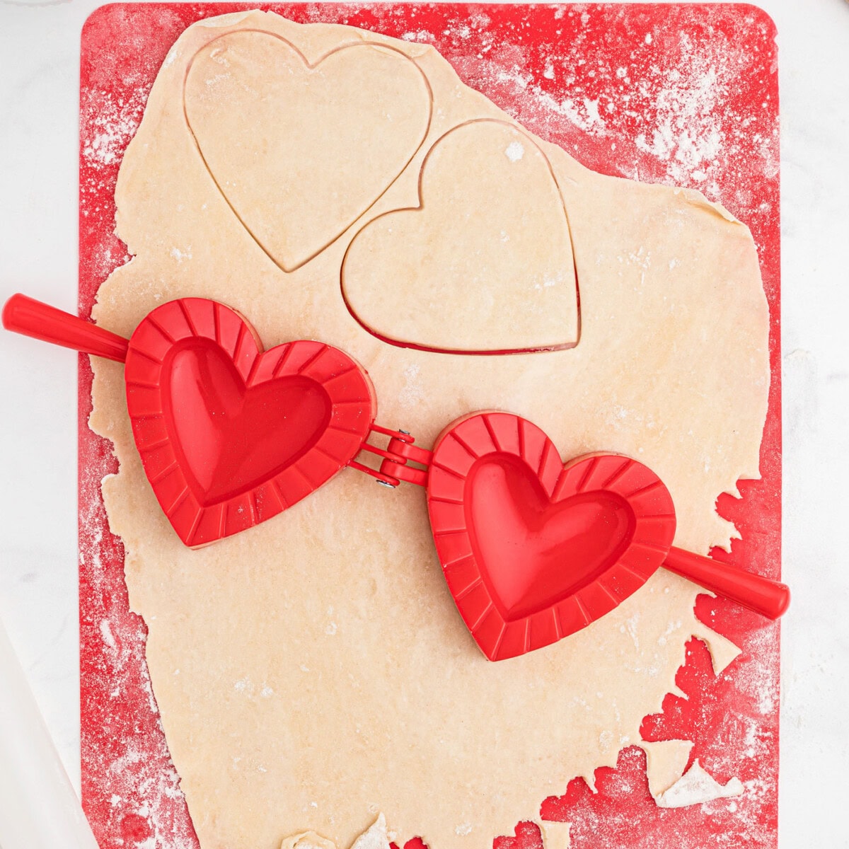 heart shaped pie press in dough