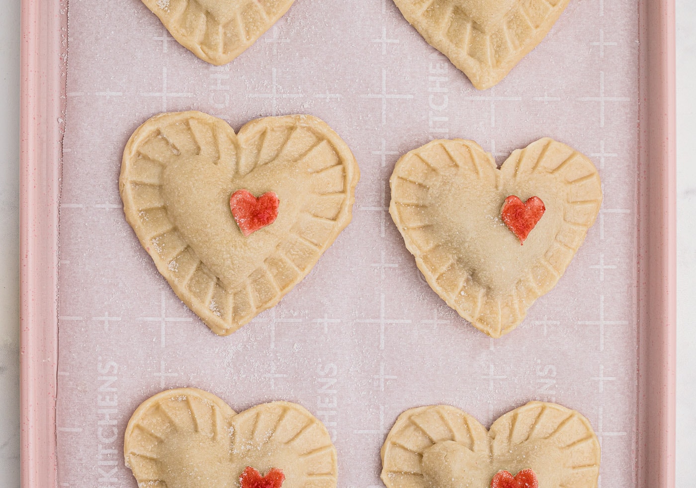 cherry hand pies with red hearts
