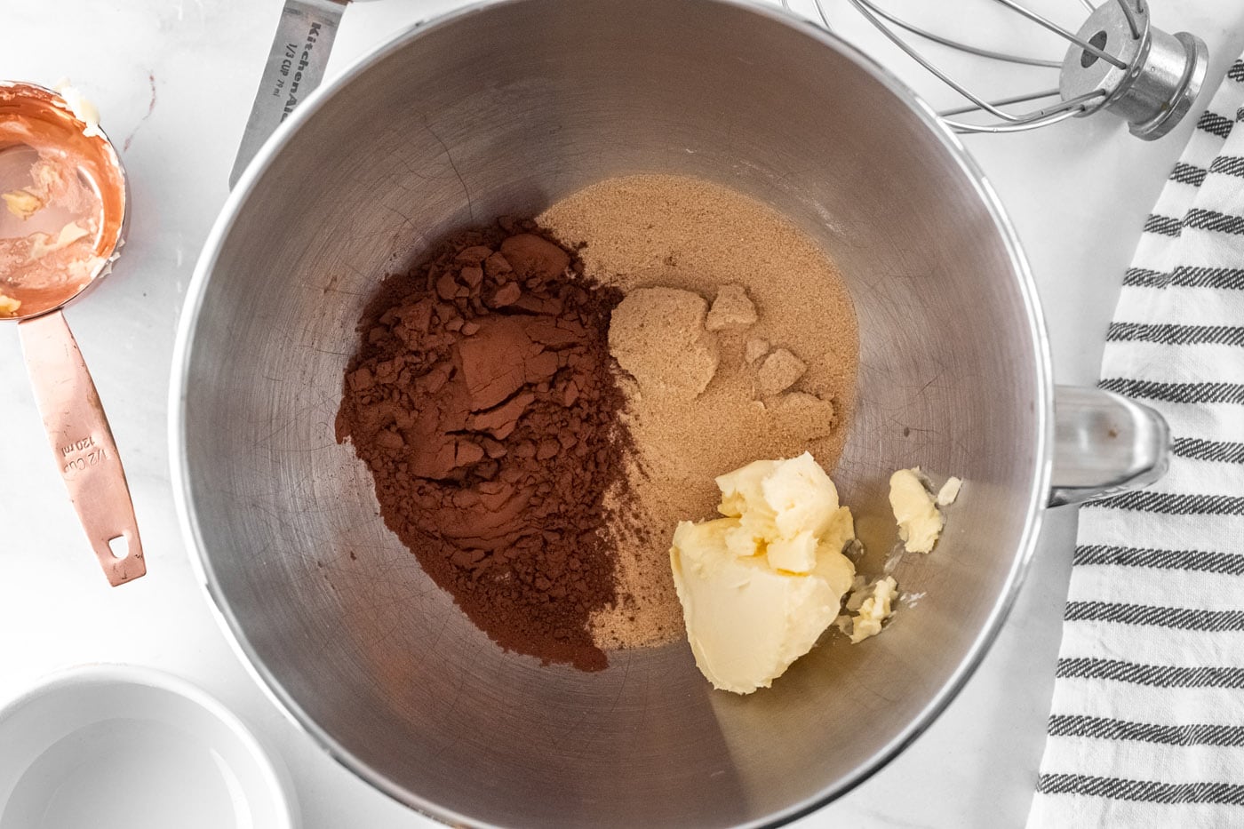 chocolate frosting ingredients in a bowl