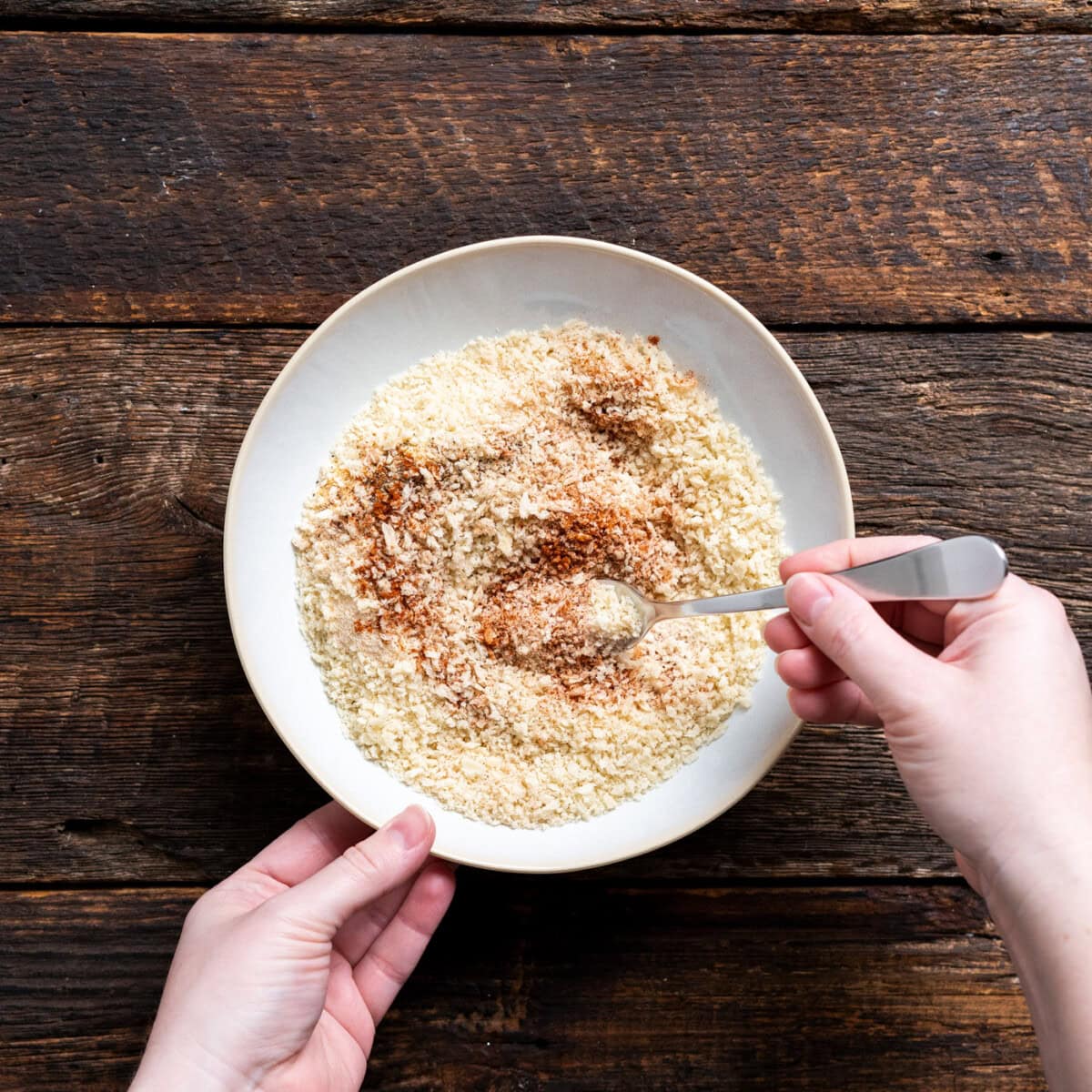 seasonings mixed with breadcrumbs in a bowl