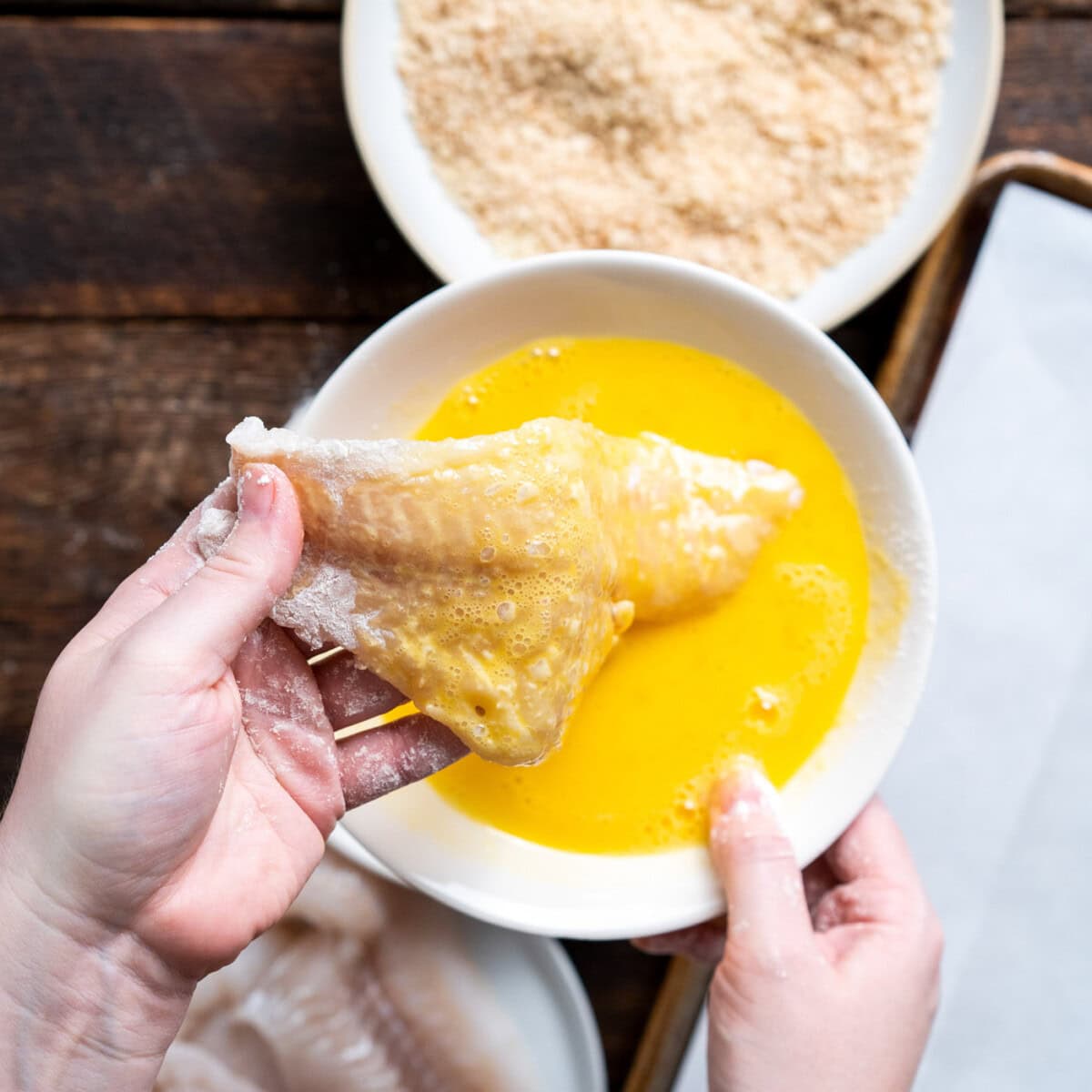 dipping cod into egg