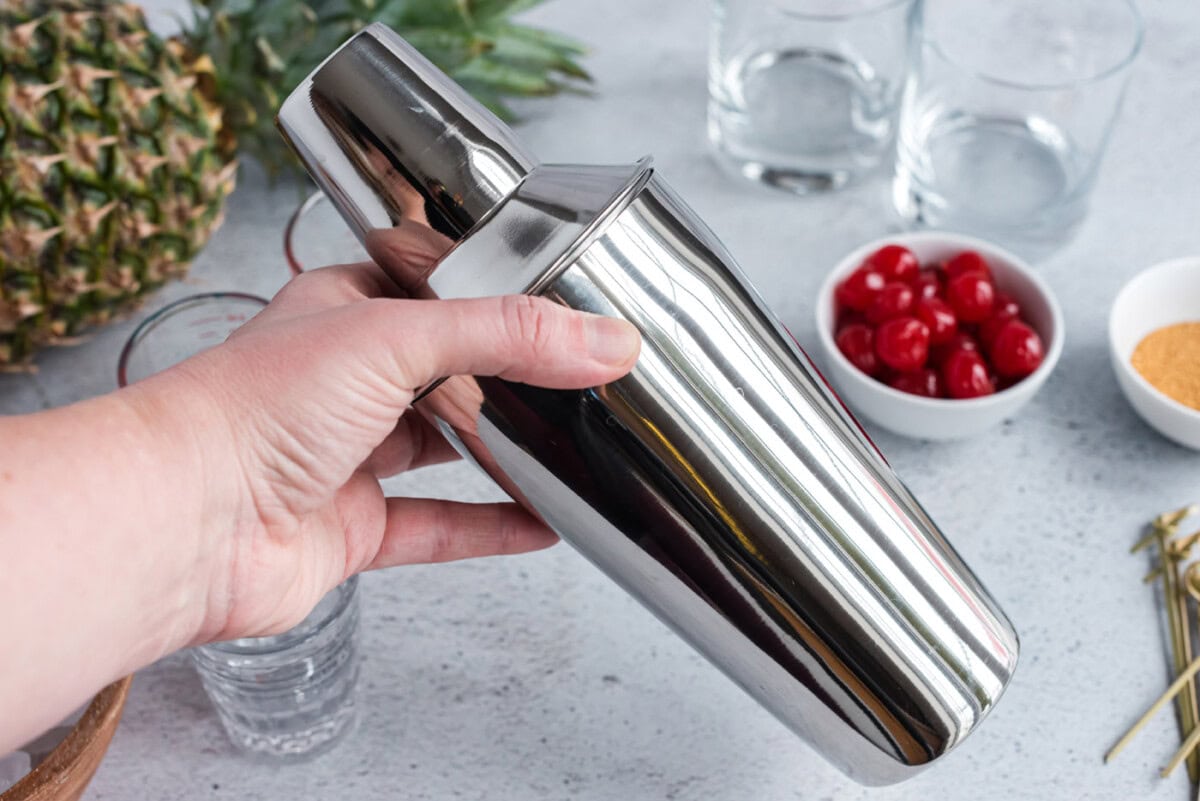 shaking a cocktail shaker