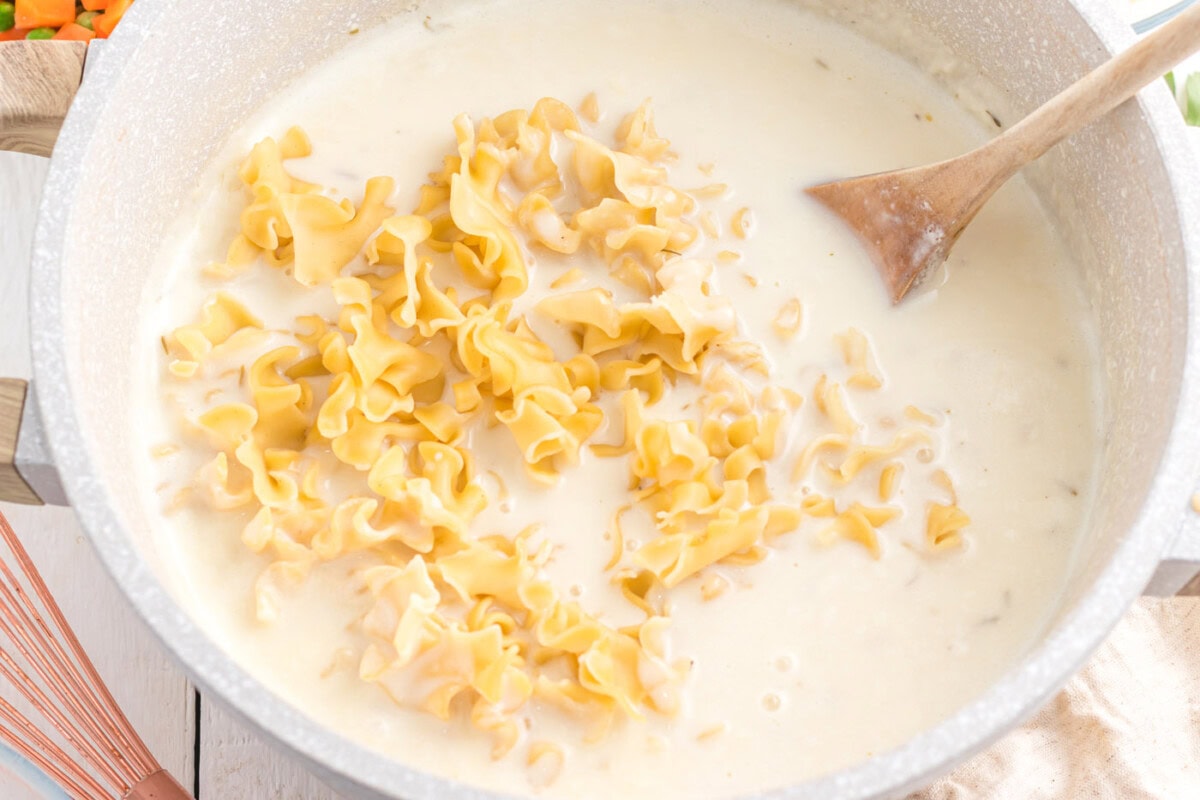 noodles stirred into cream mixture