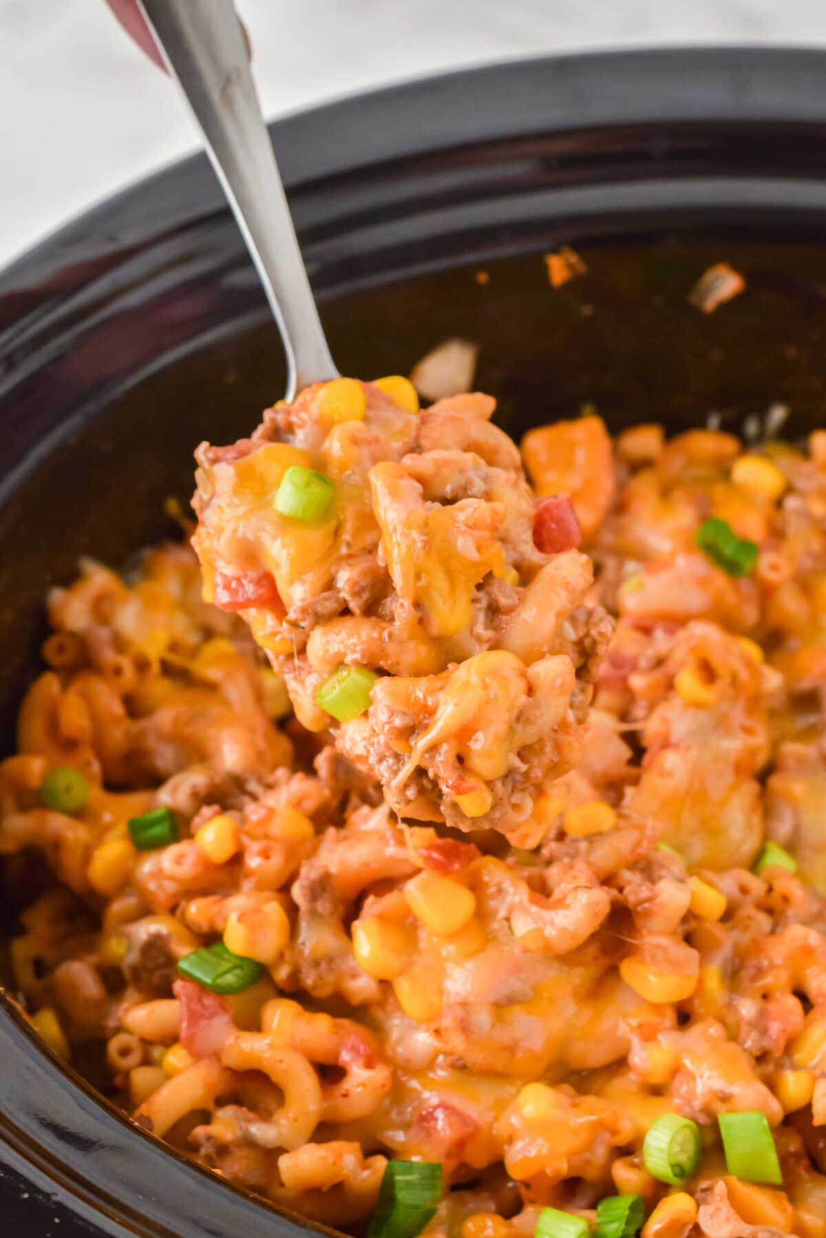 spoon of Crockpot Ground Beef Casserole