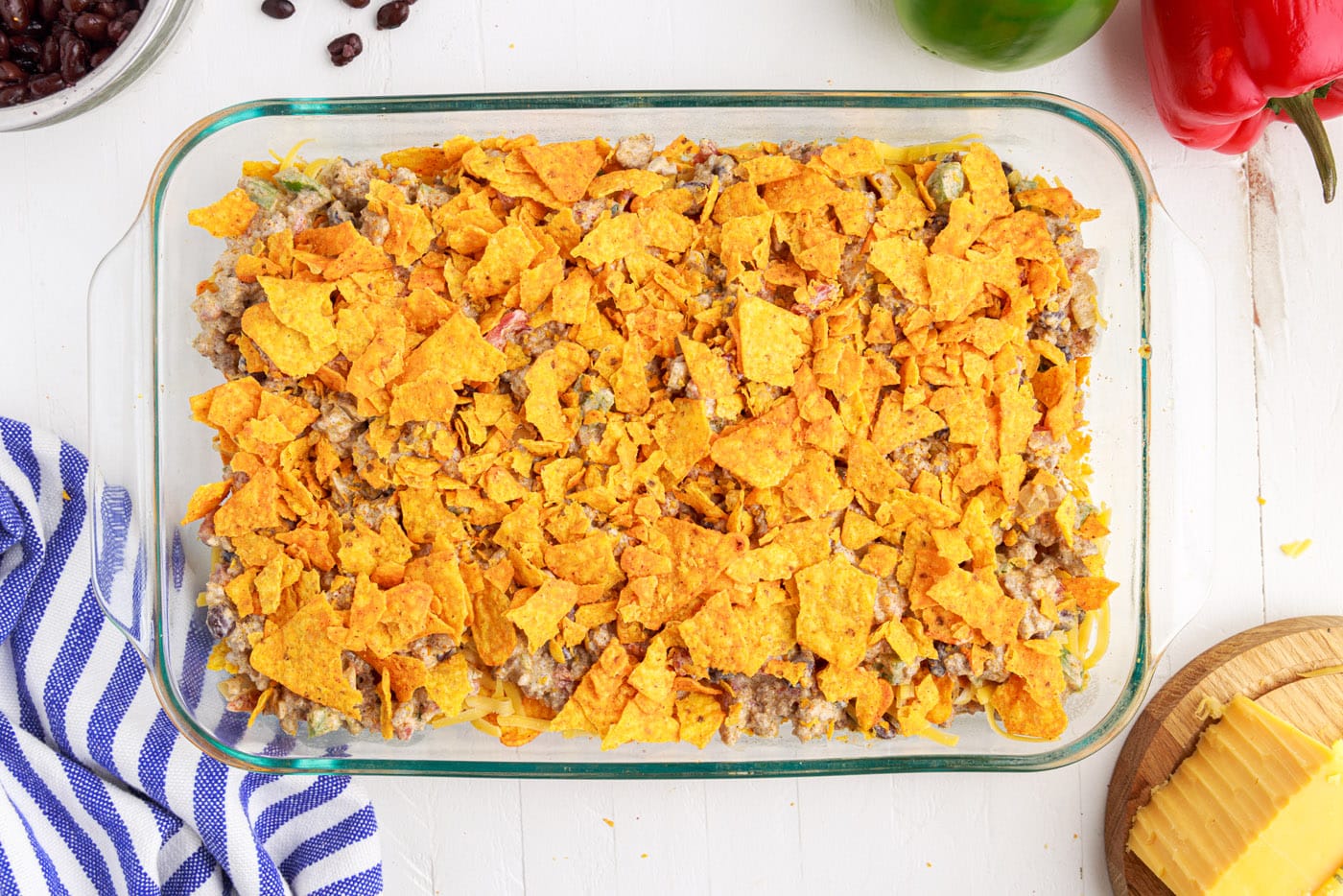 crushed doritos chips over the top of dorito casserole