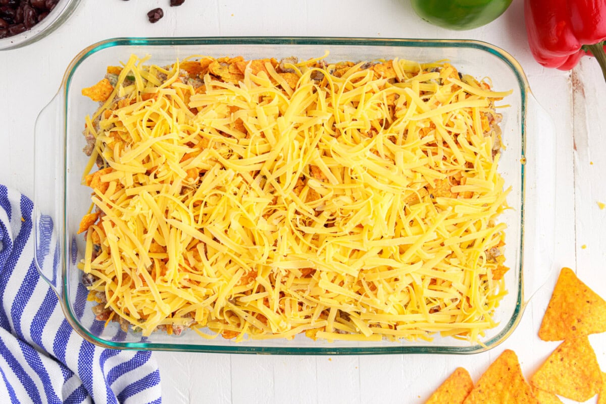 shredded cheese over ground beef dorito casserole