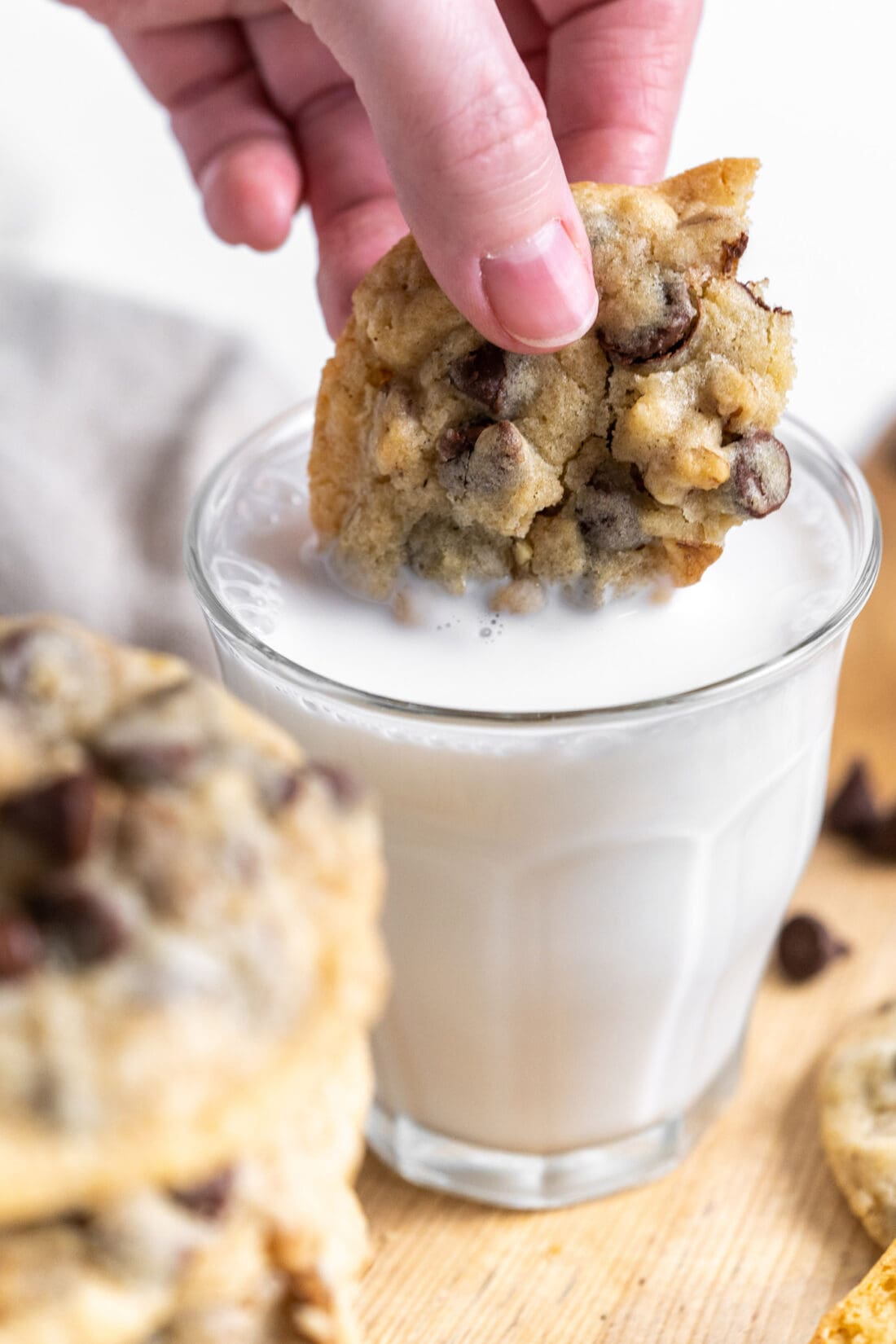 dipping a Doubletree Chocolate Chip Cookie in milk