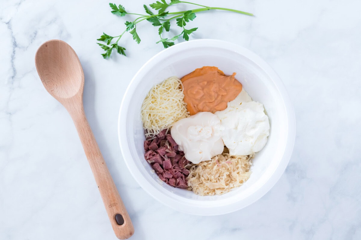 reuben dip ingredients in a bowl