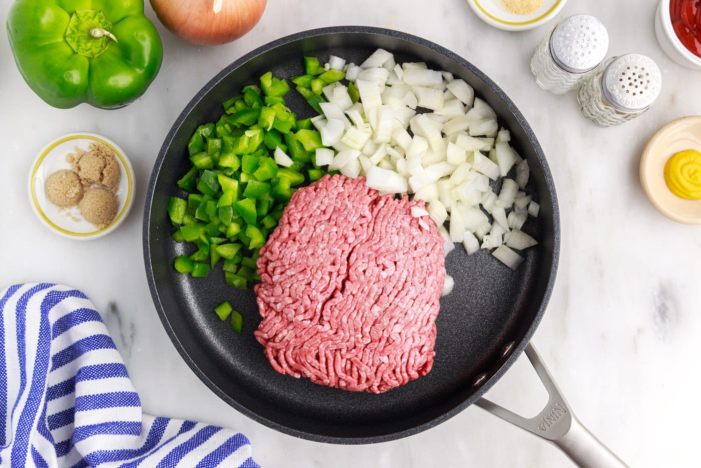 ground beef, onion, and bell pepper in a skillet