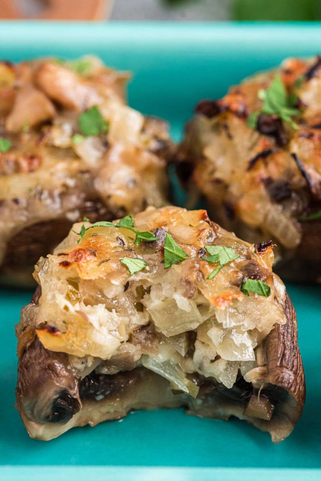 stuffed mushroom with a bite out of it