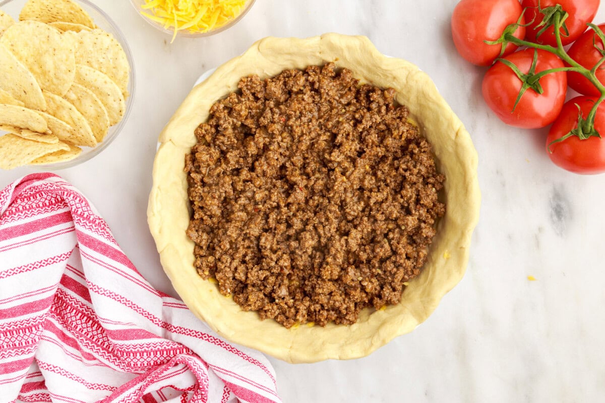 ground beef on top of crescent roll crust