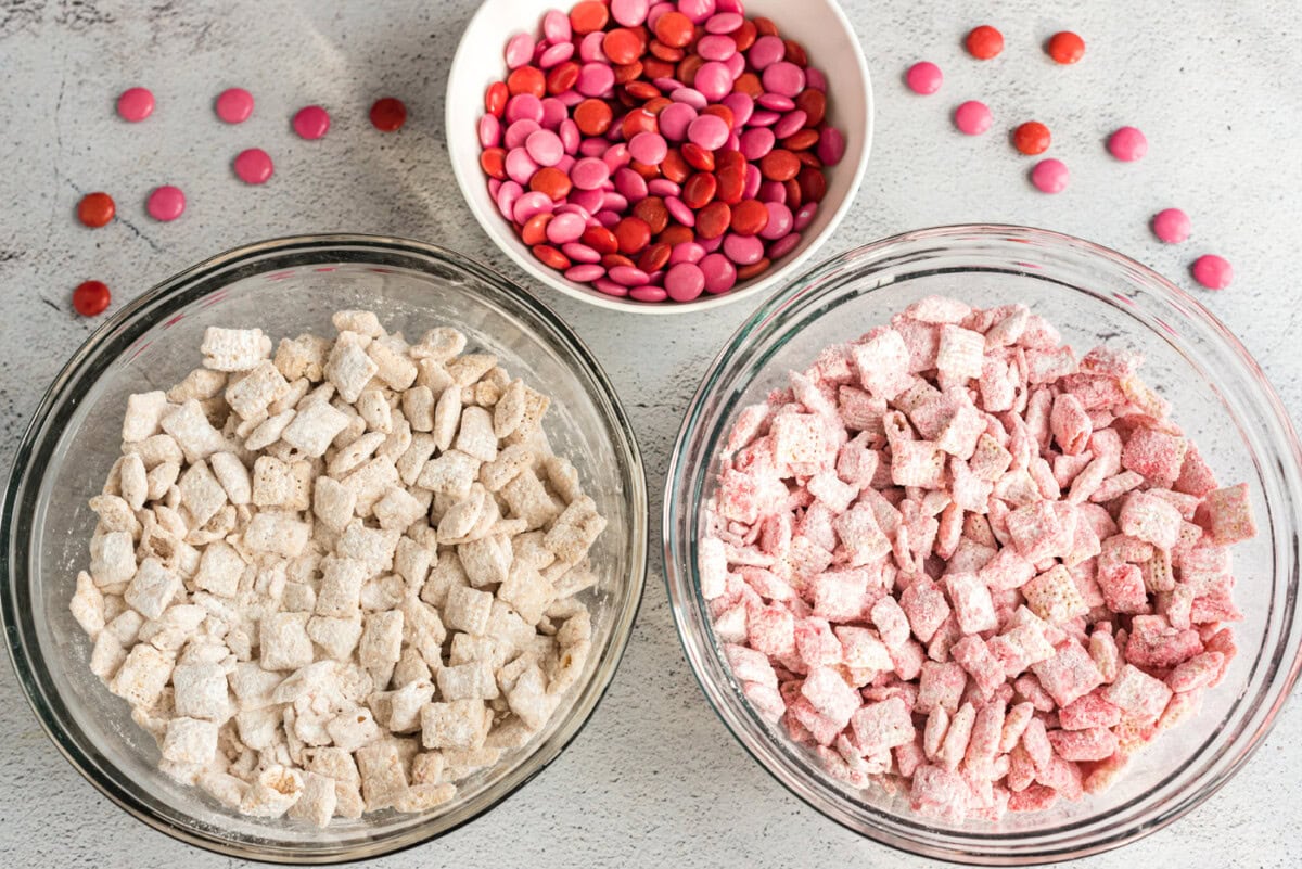 white and pink muddy buddies with m&ms