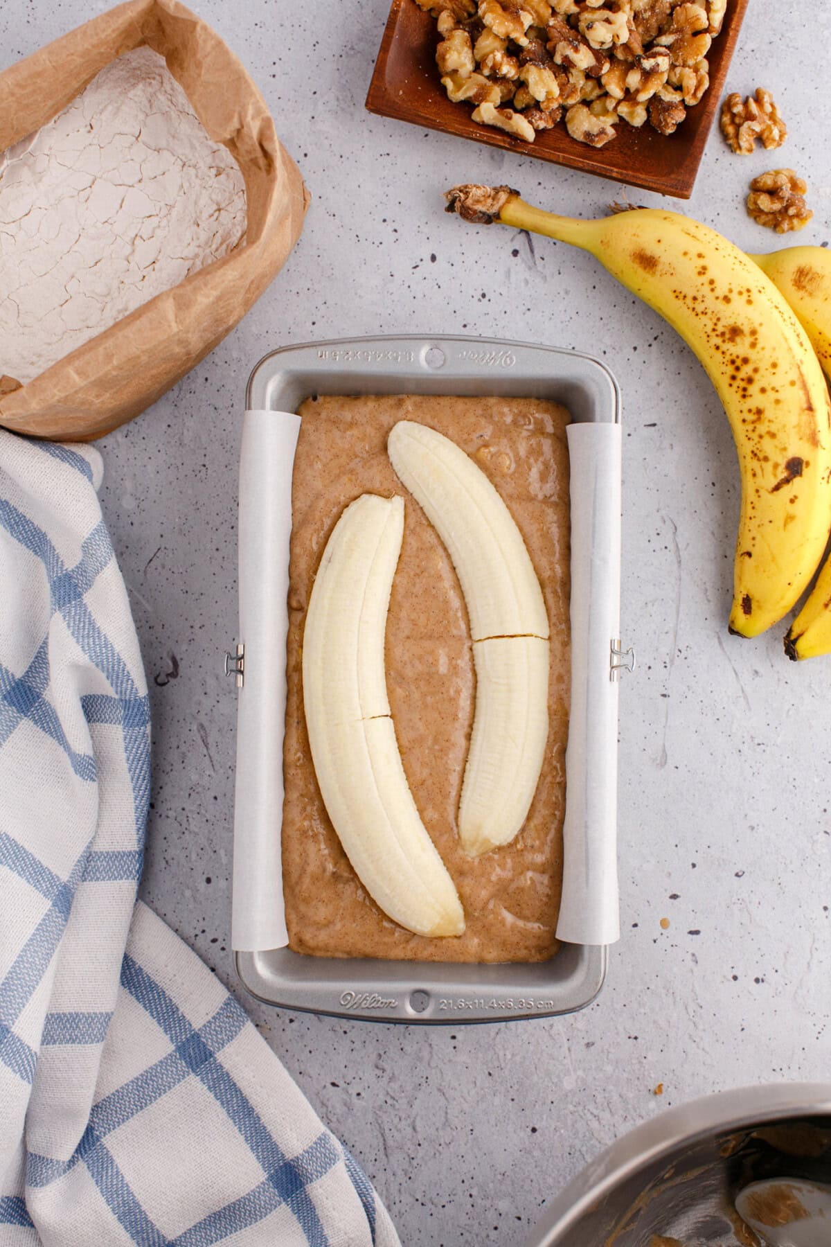 banana slice on top of banana bread batter