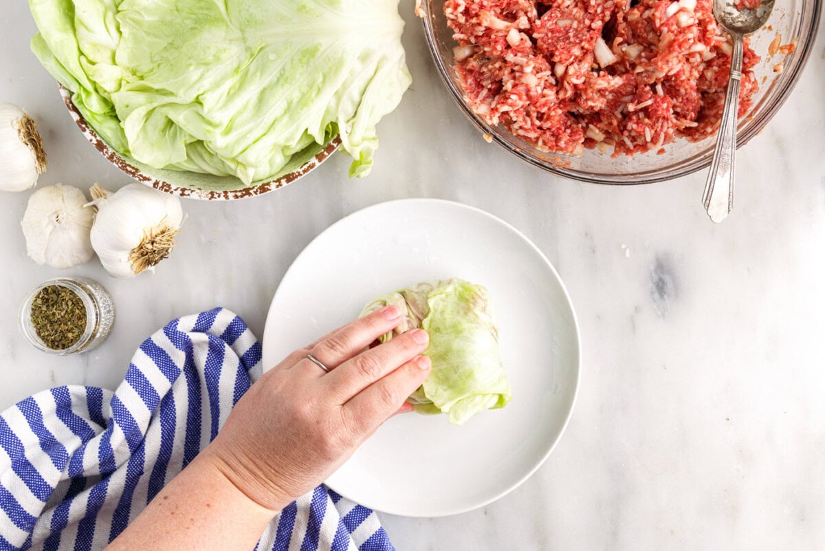 rolling cabbage rolls together