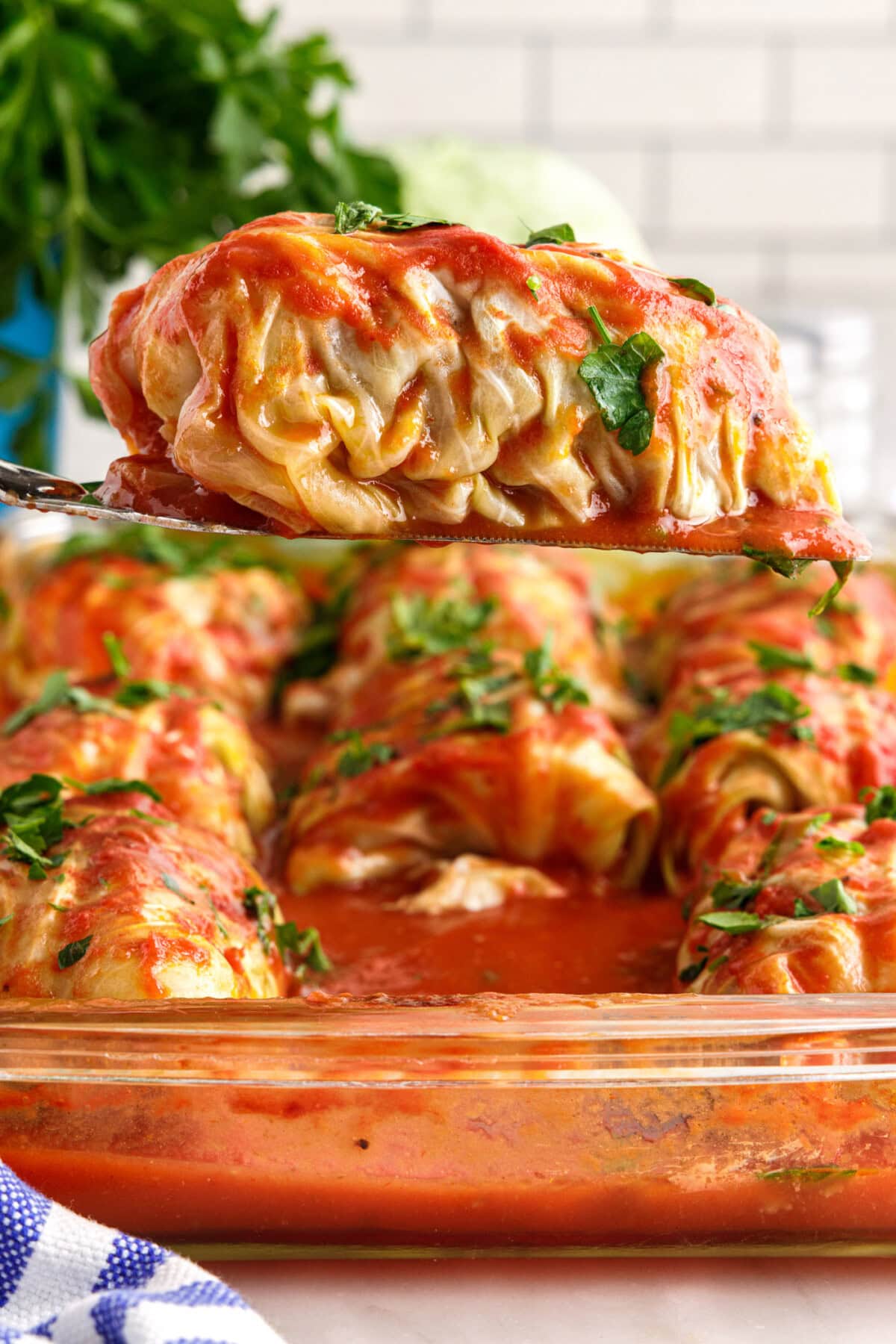 spatula lifting a Cabbage Roll from pan