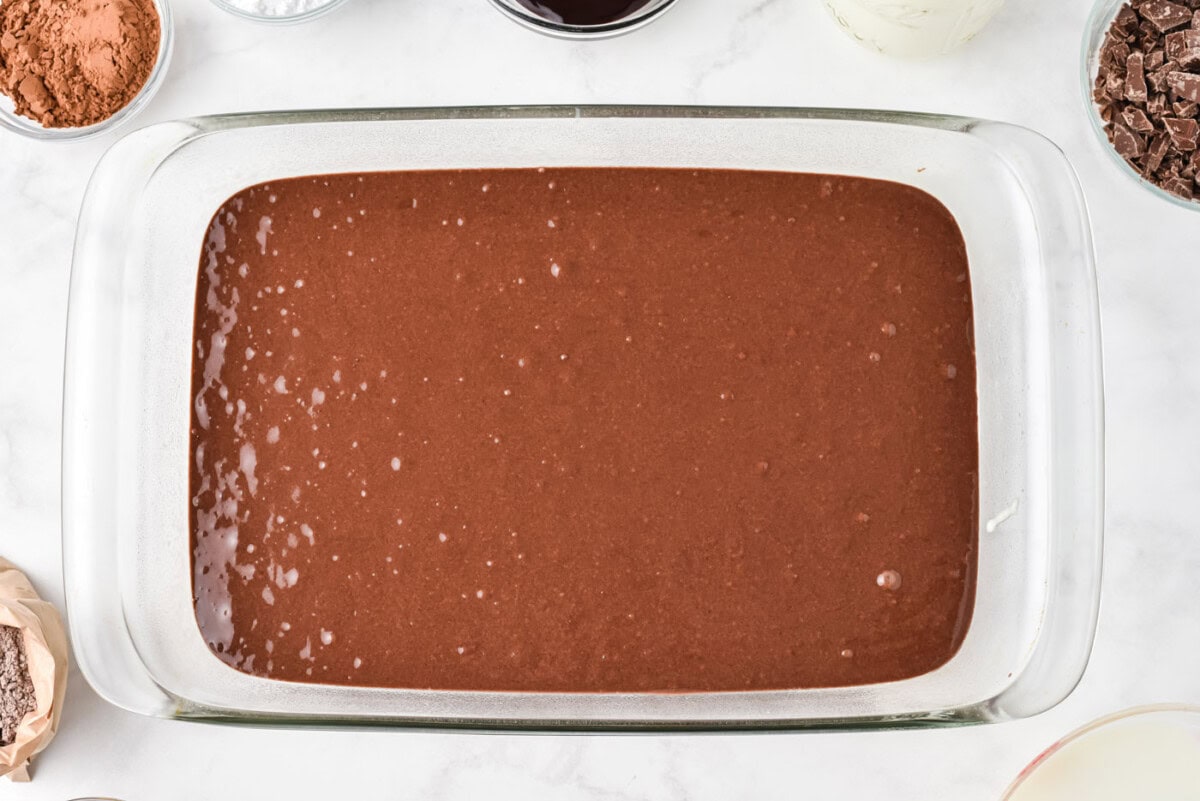 devils food cake batter in a baking dish