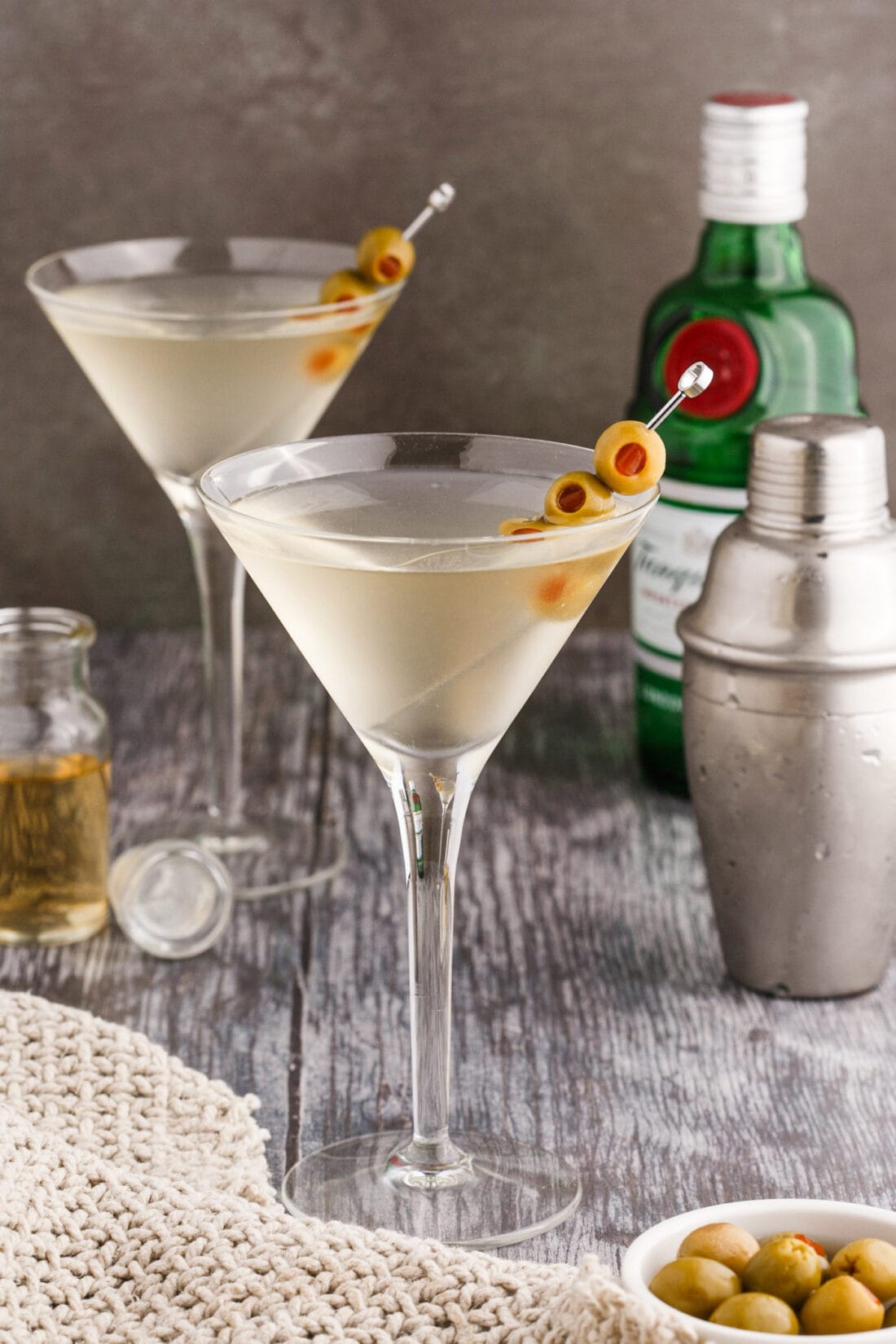 Dirty Martini with liquor bottles