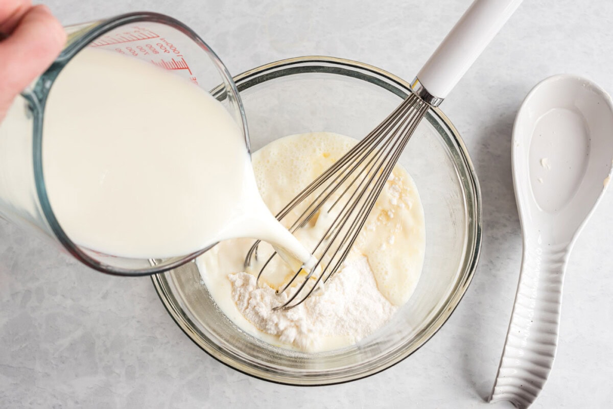 milk and instant vanilla pudding in a bowl