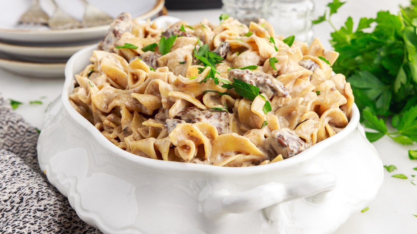 Rich creamy gravy, egg noodles, mushrooms, and tender steak marry together in the pressure cooker cr