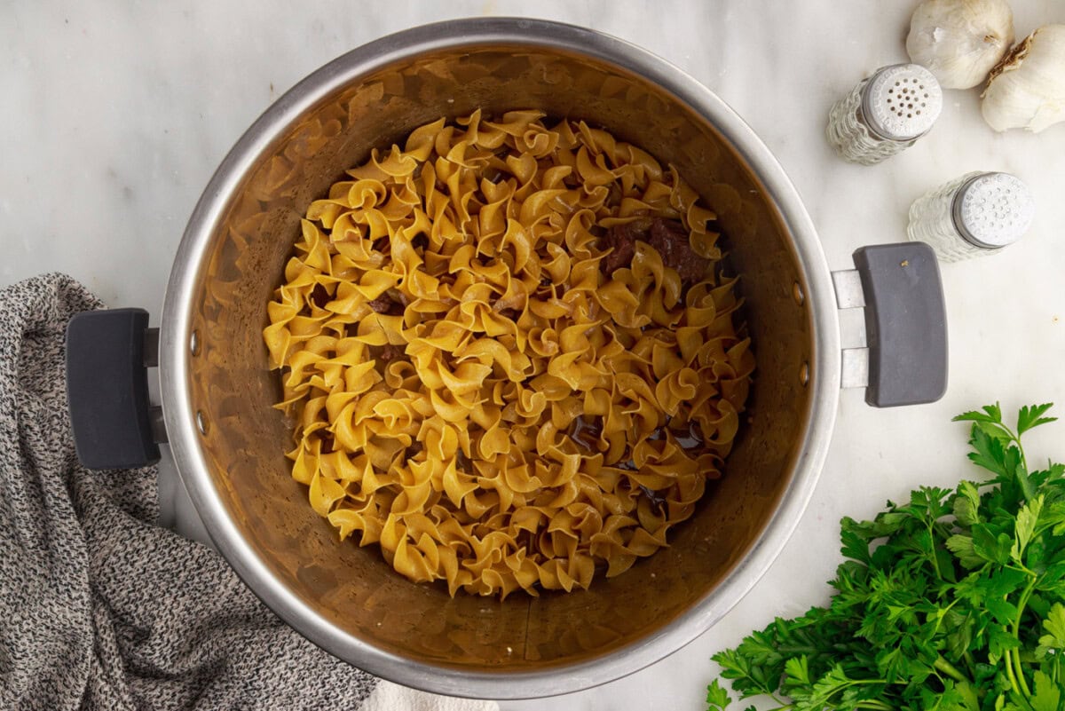 dry noodles over beef stroganoff in the instant pot